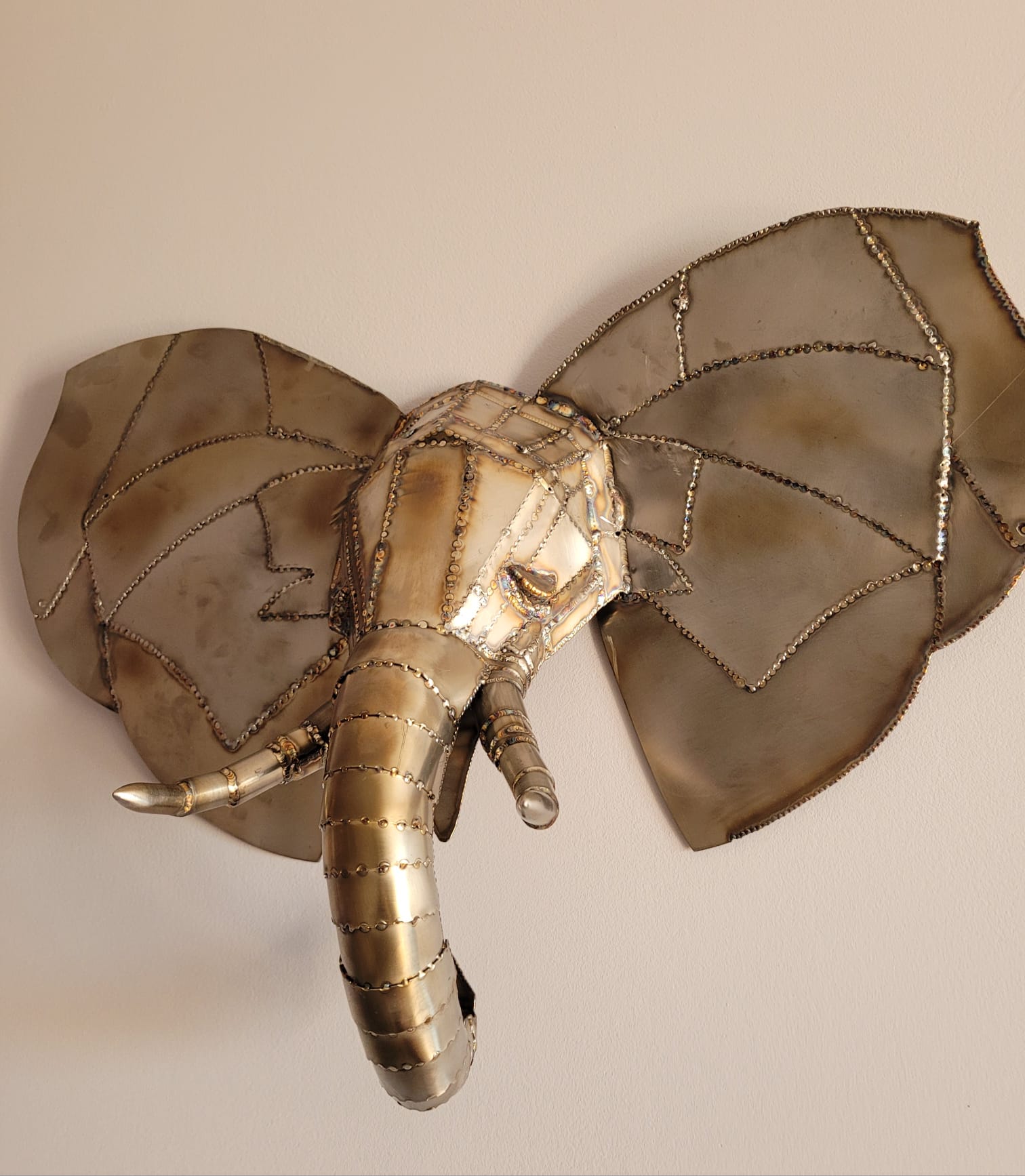 Brass elephant head sculpture